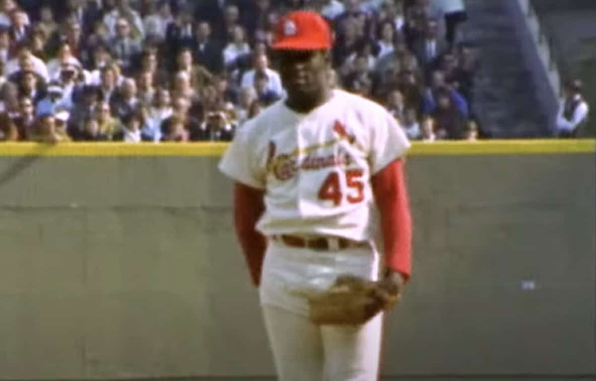 Image showcasing Bob Gibson's impressive statistics and accolades in pitching.